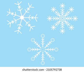 a set of elegant snowflakes on a blue background