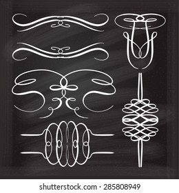 Set of elegant white flourishes for your design on the chalkboard.