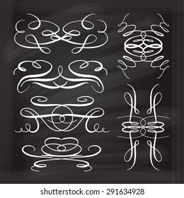 Set of elegant white flourishes for your design on the chalkboard.