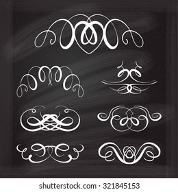 Set of elegant white flourishes for your design on the chalkboard.
