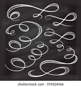 Set of elegant white flourishes for your design on the chalkboard.