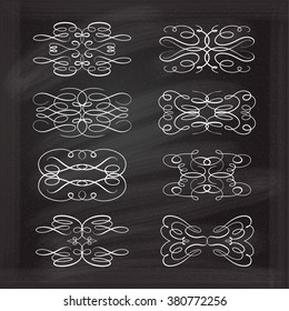 Set of elegant white flourishes for your design on the chalkboard.