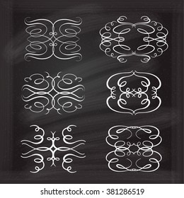 Set of elegant white flourishes for your design on the chalkboard.