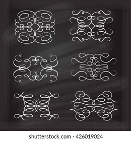 Set of elegant white flourishes for your design on the chalkboard.