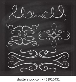 Set of elegant white flourishes for your design on the chalkboard.