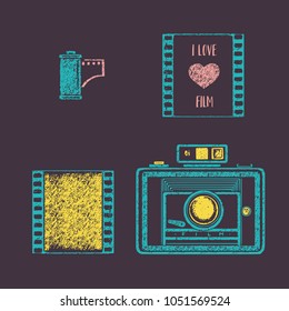 A set of elements of a film photo. An old camera, a wide-frame film and a cassette. The text "I love film".