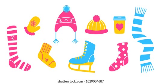 Set of elements for winter design - knitted socks, stockings, woolen hats, mittens, scarf, skates, a cup of drink