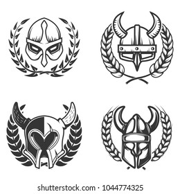 Set of emblems with medieval helmets and wreaths. Design element for logo, label, emblem, sign. Vector illustration