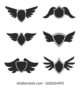 Set of emblems with wings. Design element for logo, label, emblem, sign, badge. Vector illustration