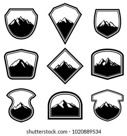 Set of empty badges with mountains. Design elements for logo, label, emblem, sign. Vector illustration