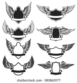 Set of the empty emblems with wings. Design elements for logo, label, badge, sign. Vector illustration