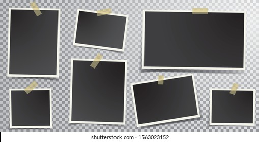 Set of empty photo frames with adhesive tape