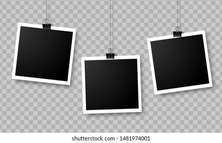 Set of empty photo frames hanging on a clip isolated on transparent background.  Photography art. Template or mockup for design.