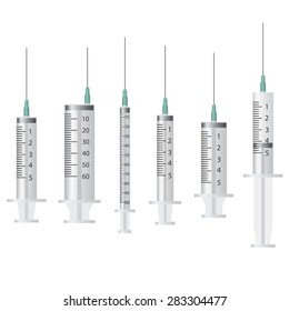 Set of empty syringes on the white background.