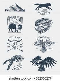 set of engraved vintage, hand drawn, old, labels or badges for camping, hiking, hunting with bald eagle. buffalo, skull. wolf and mountains with red skinned indian, native american.