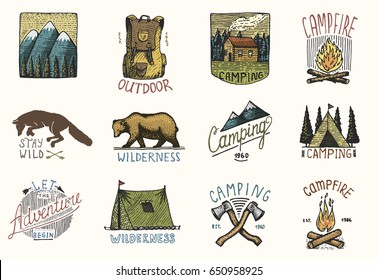 set of engraved vintage, hand drawn, old, labels or badges for camping, hiking, hunting with mountains, campfire and tent, axes. bear and backpack, wolf or red fox.