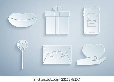 Ponga sobre con el corazón de San Valentín, móvil, Lollipop, mano corazón, caja de regalo y el icono de los labios sonrientes. Vector