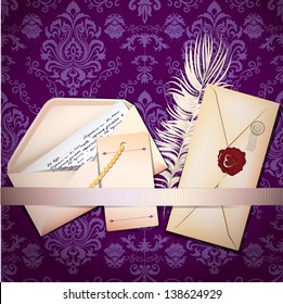 Set of envelopes and feather