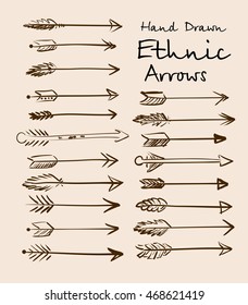 Set of ethnic arrows hand-drawn on a beige background for your design. Vector illustration