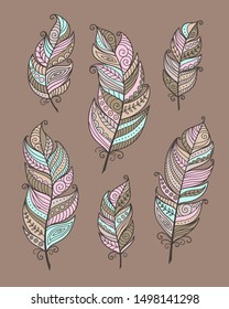 Set of ethnic bird feathers in boho style brown background. Boho collection pastel colors vector hand drawn, tribal gipsy concept. Doodles illustration. 