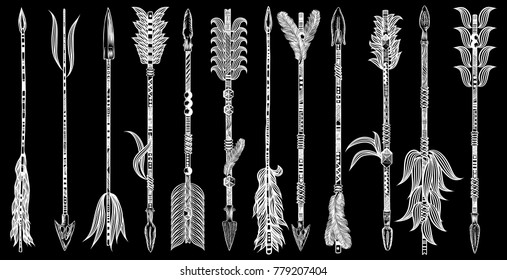 Set of ethnic Boho arrows with feathers. Decorative tribal hand drawn arrows collection with different tips and plumage. Native American style set. Vector.