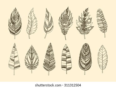 Set of ethnic feathers. Collection of vintage tribal ethnic hand drawn feathers.