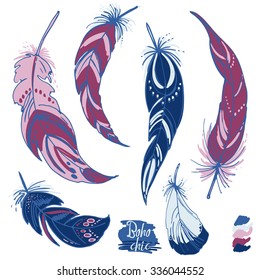 Set of ethnic feathers color. Ethnic set in native style. Feathers and beads on white background. Vector decorative elements hippie