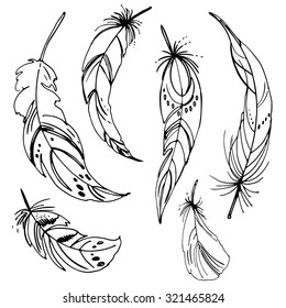 Set of ethnic feathers. Ethnic set in native style. Feathers and beads on white background. Vector decorative elements hippie