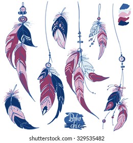 Set of ethnic feathers. Ethnic set in native style. Feathers and beads on white background. Vector color decorative elements hippie