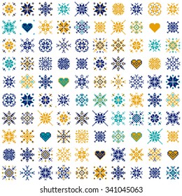 Set ethnic Slavic snowflakes. Multicolored isolated on white background. Norwegian design. Cross stitch scheme.