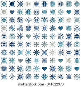 Set ethnic Slavic snowflakes. Multicolored isolated on white background. Norwegian design. Cross stitch scheme.