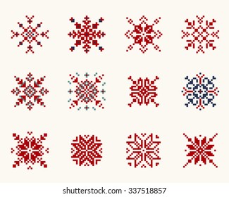 Set ethnic Slavic snowflakes. Red isolated on white background. Norwegian design. Cross stitch scheme.
