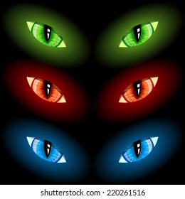 Set of evil eyes on black background, vector