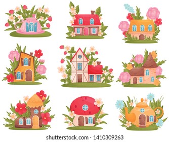 Set of fabulous houses of different shapes among the flowers and grass. Vector illustration on white background.