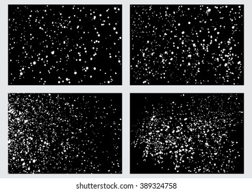 Set of falling, blowing snow texture pattern on black background. Collection of winter holiday mood background. Bundle of winter weather or snowstorm, snow with white snowflakes winter sky.