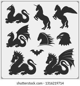 Set of fantastic animals. Silhouettes of unicorn, pegasus, dragon. Eagle and bat icons. Print design for t-shirts and greeting cards. 