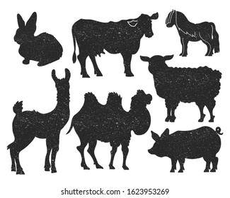 Set of farm and domestic animals vector silhouettes. Grunge retro textured icons of livestock such as: cow, lamb, pig, camel, llama, pony and rabbit.