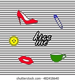 Set of fashion badges, stickers, pins and patches including kiss me quote, shoe, pin, button, tee cup and red lips on striped background.