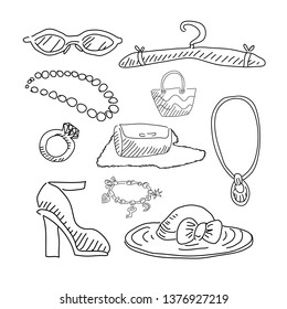 Set of fashion doodles. Hand drawn icons of women accessories. Vector elements on white background