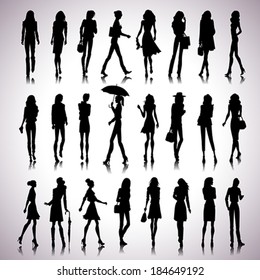 Set of female silhouettes in the city on abstract background