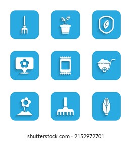 Set Fertilizer bag, Garden rake, Corn, Wheelbarrow with dirt, Flower, Location flower, Shield leaf and  icon. Vector