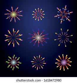 A set of festive multi-colored, different-shaped fireworks on a dark night background. Vector