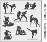 Set of fighting club emblems, labels, badges and icons. Fighters silhouettes.