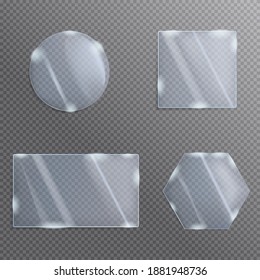 A set of figured glass of different shapes. Set shiny protective glass plates.