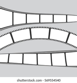 Set of film or camera strips on gray background