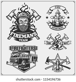 Set of firefighter emblems, labels and design elements. Vector monochrome illustration.