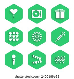 Set Firework, Carnival garland with flags, Christmas lights, rocket, Karaoke microphone, Gift box and Balloon in form of heart icon. Vector