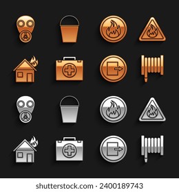 Set First aid kit, Fire flame in triangle, hose reel, exit, burning house, Gas mask and bucket icon. Vector