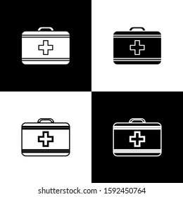 Set First aid kit icon isolated on black and white background. Medical box with cross. Medical equipment for emergency. Healthcare concept.  Vector Illustration