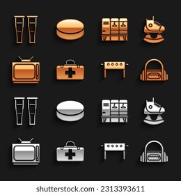 Set First aid kit, Skates, Sport bag, Hockey table, Retro tv, Locker changing room, Crutch crutches and puck icon. Vector